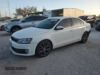 2013 Volkswagen Jetta GLI with VIN 3VW4S7AJ3DM290987, listed as a Copart auction lot 77007514 with 160,978 mi miles and Salvage Title. Bid and sale history available at DreamBid. Image 1.
