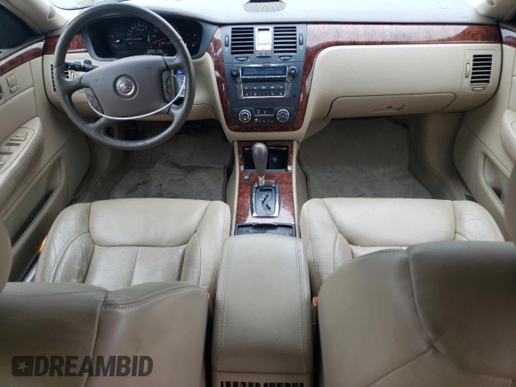2006 Cadillac DTS 1SC z VIN 1G6KD57Y26U182388, wystawiony jako Copart lot #71929184 z przebiegiem 91 711 mil mil oraz Szkoda całkowita • Salvage title. Historia ofert i sprzedaży dostępna na DreamBid. Obrazek 8.
