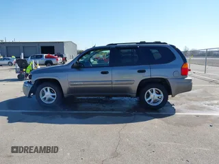 2005 GMC Envoy SLE z VIN 1GKDT13S252331044, wystawiony jako IAAI lot #41749219 z przebiegiem 263 876 mil mil oraz . Historia ofert i sprzedaży dostępna na DreamBid. Obrazek 15.