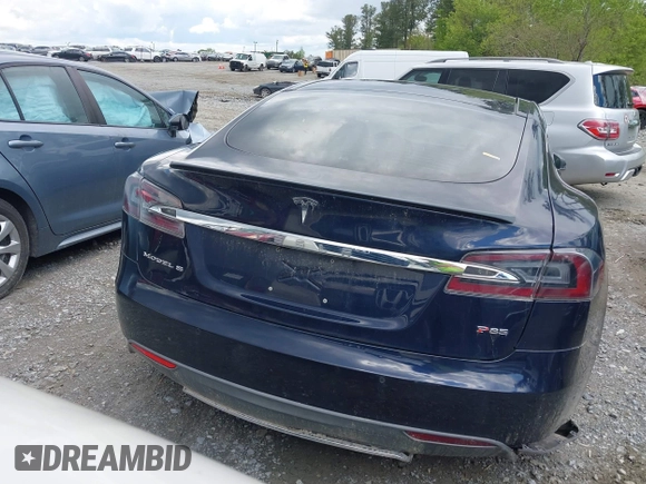 2014 Tesla Model S 60 with VIN 5YJSA1H15EFP43884, listed as a IAAI auction lot 41993180 with 78,305 mi miles and . Bid and sale history available at DreamBid. Image 15.