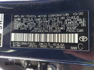 2021 Toyota Corolla Hybrid LE with VIN JTDEAMDEXMJ018828, listed as a IAAI auction lot 41633192 with 63,302 mi miles. Bid and sale history available at carsss.com. Image 9.