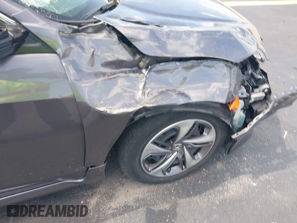 2020 Honda Civic LX with VIN 19XFC2F68LE007735, listed as a IAAI auction lot 42215294 with 3,849 mi miles and . Bid and sale history available at DreamBid. Image 6.