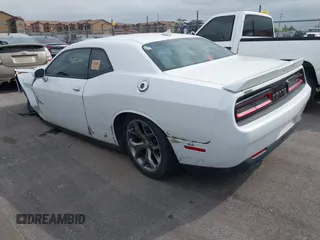 2015 Dodge Challenger SXT Plus with VIN 2C3CDZBG8FH906356, listed as a IAAI auction lot 42396865 with 184,565 mi miles and . Bid and sale history available at DreamBid. Image 3.