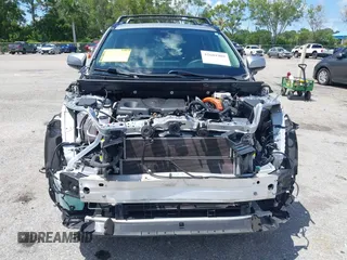 2021 Toyota RAV4 Hybrid LE with VIN 2T3B6RFV2MW018967, listed as a IAAI auction lot 42601989 with 71,046 mi miles and . Bid and sale history available at DreamBid. Image 13.