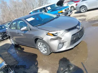 2015 Toyota Corolla L with VIN 5YFBURHE5FP345234, listed as a IAAI auction lot 41764976 with 221,888 mi miles and . Bid and sale history available at DreamBid. Image 1.