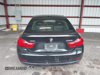 2015 BMW 4 Series 428i xDrive with VIN WBA4C9C57FD331872, listed as a IAAI auction lot 42276675 with 106,543 mi miles and . Bid and sale history available at DreamBid. Image 16.