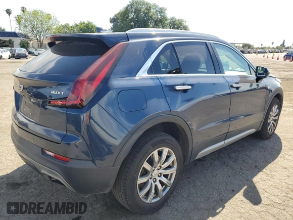 2019 Cadillac XT4 FWD Premium Luxury with VIN 1GYFZCR42KF104457, listed as a Copart auction lot 52783485 with 57,572 mi miles and Salvage title. Bid and sale history available at DreamBid. Image 3.