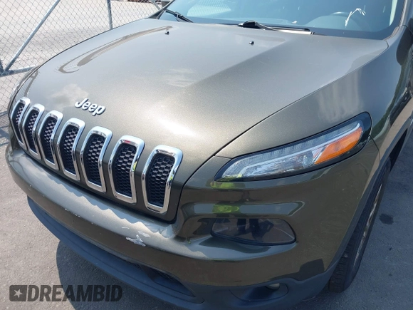 2015 Jeep Cherokee Latitude z VIN 1C4PJMCS9FW551694, wystawiony jako IAAI lot #42424992 z przebiegiem 125 852 mil mil oraz . Historia ofert i sprzedaży dostępna na DreamBid. Obrazek 6.