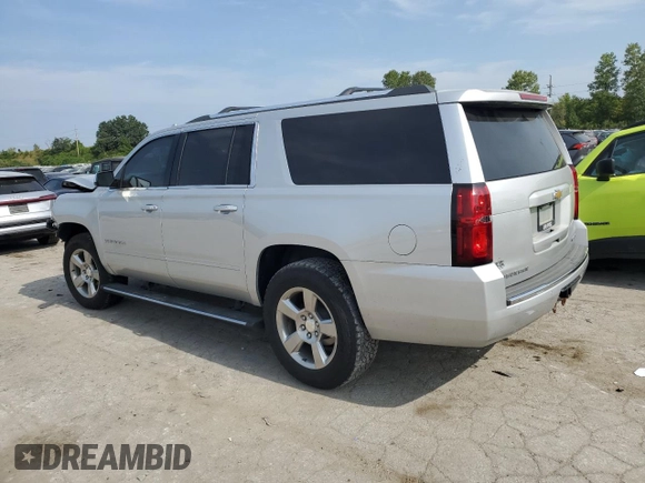 2020 Chevrolet Suburban Premier z VIN 1GNSKJKC0LR164243, wystawiony jako Copart lot #70530624 z przebiegiem Nie podano mil oraz Szkoda całkowita • Salvage title. Historia ofert i sprzedaży dostępna na DreamBid. Obrazek 2.