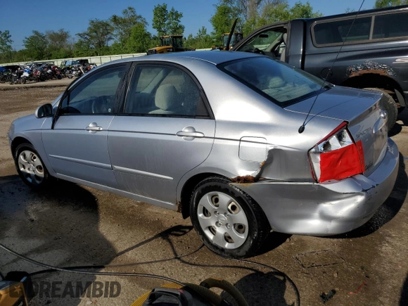 2006 Kia Spectra EX z VIN KNAFE121565370909, wystawiony jako Copart lot #56572995 z przebiegiem 102 978 mil mil oraz Szkoda całkowita • Salvage title. Historia ofert i sprzedaży dostępna na DreamBid. Obrazek 2.