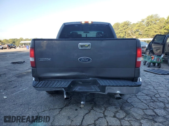 2004 Ford F-150 XLT with VIN 1FTRX12514KD37885, listed as a Copart auction lot 73998724 with 164,189 mi miles and Salvage Title. Bid and sale history available at carsss.com. Image 6.