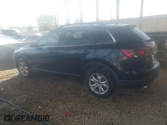 2015 Mazda CX-9 Touring z VIN JM3TB2CA5F0455109, wystawiony jako Copart lot #46899815 z przebiegiem 131 847 mil mil oraz Szkoda całkowita • Salvage title. Historia ofert i sprzedaży dostępna na DreamBid. Obrazek 2.
