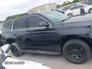 2018 Chevrolet Tahoe Commercial z VIN 1GNLCDEC6JR204921, wystawiony jako IAAI lot #42039630 z przebiegiem 96 008 mil mil oraz . Historia ofert i sprzedaży dostępna na DreamBid. Obrazek 13.