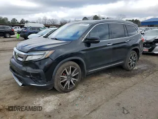 2019 Honda Pilot Touring 7-Passenger with VIN 5FNYF5H65KB010079, listed as a Copart auction lot 44235885 with 71,180 mi miles and Salvage title. Bid and sale history available at DreamBid. Image 1.