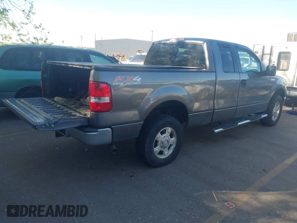 2005 Ford F-150 XLT with VIN 1FTPX14585NB56142, listed as a IAAI auction lot 42168338 with 208,074 mi miles. Bid and sale history available at carsss.com. Image 4.