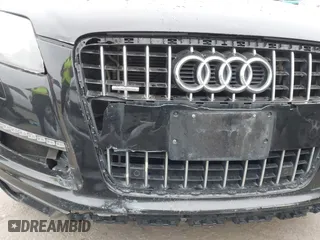 2014 Audi Q7 3.0T Premium Plus with VIN WA1LGAFE9ED021103, listed as a IAAI auction lot 42042495 with 186,446 mi miles. Bid and sale history available at carsss.com. Image 6.