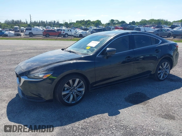 2020 Mazda 6 Touring with VIN JM1GL1VMXL1517828, listed as a IAAI auction lot 41511804 with 123,174 mi miles. Bid and sale history available at carsss.com. Image 2.