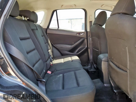 2014 Mazda CX-5 Touring with VIN JM3KE2CY5E0316077, listed as a Copart auction lot 58218735 with 190,789 mi miles and Salvage title. Bid and sale history available at DreamBid. Image 11.