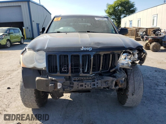 2008 Jeep Grand Cherokee Laredo with VIN 1J8GR48KX8C102393, listed as a Copart auction lot 69696834 with 173,049 mi miles and Salvage Title. Bid and sale history available at carsss.com. Image 5.