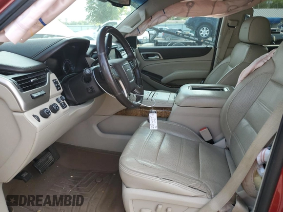 2015 GMC Yukon Denali with VIN 1GKS2CKJ6FR136152, listed as a Copart auction lot 76967664 with 137,208 mi miles and Salvage Title. Bid and sale history available at carsss.com. Image 7.