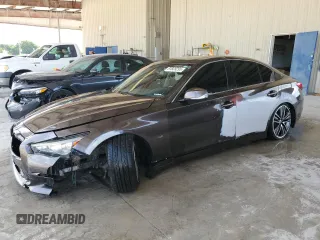 2015 Infiniti Q50 with VIN JN1BV7AP4FM335961, listed as a Copart auction lot 61829295 with 130,327 mi miles and Salvage title. Bid and sale history available at DreamBid. Image 1.