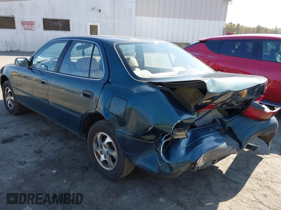 1996 Toyota Camry DX with VIN 4T1BG12K1TU688639, listed as a IAAI auction lot 41883160 with 264,542 mi miles. Bid and sale history available at carsss.com. Image 3.