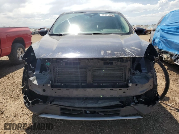 2021 Ford Escape SE with VIN 1FMCU9G66MUA94797, listed as a Copart auction lot 60864235 with 64,712 mi miles and Salvage title. Bid and sale history available at DreamBid. Image 5.