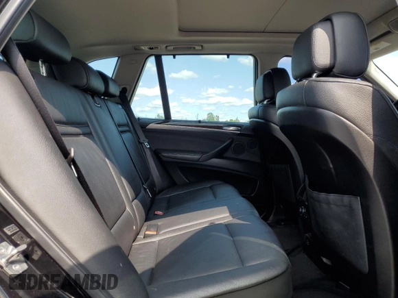 2012 BMW X5 35i with VIN 5UXZV4C59CL752661, listed as a Copart auction lot 58590305 with 101,725 mi miles and Salvage title. Bid and sale history available at DreamBid. Image 11.