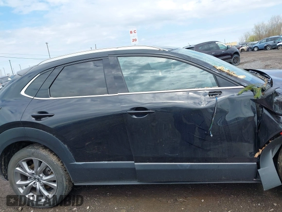 2022 Mazda CX-30 S Premium with VIN 3MVDMBDL5NM413878, listed as a IAAI auction lot 42189008 with 46,249 mi miles and . Bid and sale history available at DreamBid. Image 13.