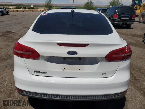 2017 Ford Focus SE with VIN 1FADP3F26HL304540, listed as a Copart auction lot 56597875 with 139,613 mi miles and Clean Title. Bid and sale history available at DreamBid. Image 6.