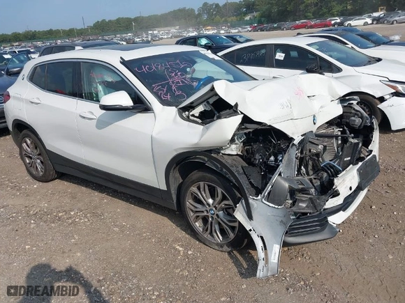 2022 BMW X2 sDrive28i with VIN WBXYH9C04N5U11829, listed as a IAAI auction lot 40184510 with 59,426 mi miles. Bid and sale history available at carsss.com. Image 1.