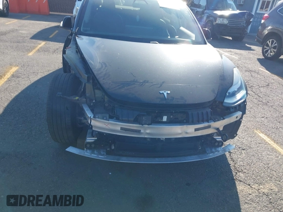 2018 Tesla Model 3 Long Range Battery with VIN 5YJ3E1EA5JF171948, listed as a IAAI auction lot 41993887 with 42,370 mi miles and . Bid and sale history available at DreamBid. Image 11.