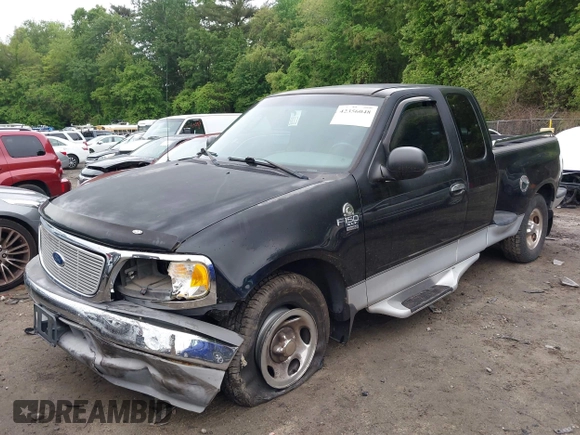2003 Ford F-150 XL with VIN 1FTRX07W73KD29879, listed as a IAAI auction lot 42356048 with Not provided miles and . Bid and sale history available at DreamBid. Image 2.