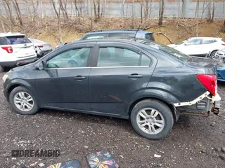 2014 Chevrolet Sonic LT with VIN 1G1JC5SH5E4202854, listed as a IAAI auction lot 42049844 with 150,705 mi miles and . Bid and sale history available at DreamBid. Image 14.