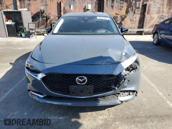 2023 Mazda 3 Premium Plus with VIN 3MZBPBEY5PM374977, listed as a Copart auction lot 70642804 with 9,029 mi miles and Salvage Title. Bid and sale history available at DreamBid. Image 5.
