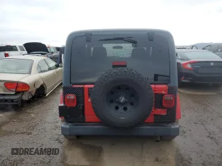 2003 Jeep Wrangler X z VIN 1J4FA39S73P355945, wystawiony jako Copart lot #43667775 z przebiegiem 123 823 mil mil oraz Czysty tytuł • Clean title. Historia ofert i sprzedaży dostępna na DreamBid. Obrazek 6.