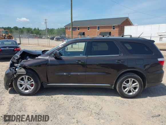 2013 Dodge Durango SXT with VIN 1C4RDJAG7DC580249, listed as a IAAI auction lot 42535723 with 199,626 mi miles and . Bid and sale history available at DreamBid. Image 14.