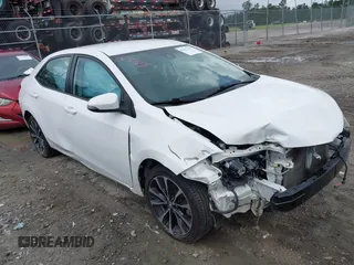 2017 Toyota Corolla L z VIN 2T1BURHE6HC928852, wystawiony jako IAAI lot #42477296 z przebiegiem 165 908 mil mil oraz . Historia ofert i sprzedaży dostępna na DreamBid. Obrazek 1.