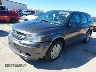 2015 Dodge Journey SE z VIN 3C4PDCAB5FT739266, wystawiony jako IAAI lot #41725086 z przebiegiem 134 109 mil mil oraz . Historia ofert i sprzedaży dostępna na DreamBid. Obrazek 17.