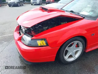 2002 Ford Mustang GT Deluxe z VIN 1FAFP42X32F161388, wystawiony jako IAAI lot #42271266 z przebiegiem 140 821 mil mil oraz . Historia ofert i sprzedaży dostępna na DreamBid. Obrazek 18.