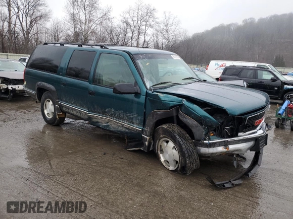 1995 GMC Suburban z VIN 1GKFK16K0SJ748087, wystawiony jako Copart lot #85121834 z przebiegiem 191 550 mil mil oraz Szkoda całkowita • Salvage title. Historia ofert i sprzedaży dostępna na DreamBid. Obrazek 4.