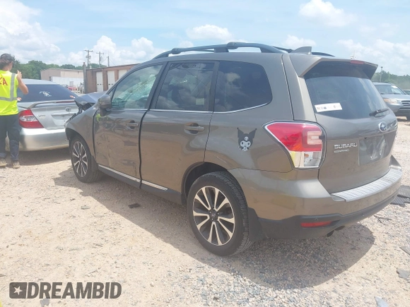 2017 Subaru Forester Touring with VIN JF2SJGWCXHH558789, listed as a IAAI auction lot 42518698 with 112,294 mi miles and . Bid and sale history available at DreamBid. Image 3.