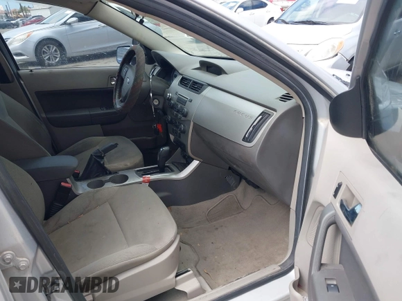 2008 Ford Focus SE with VIN 1FAHP35N18W199448, listed as a IAAI auction lot 42088860 with 174,391 mi miles. Bid and sale history available at carsss.com. Image 5.