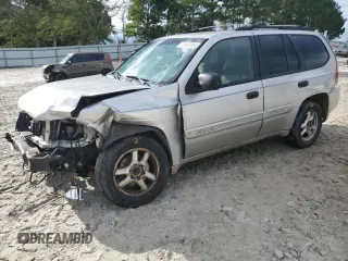 2004 GMC Envoy SLE with VIN 1GKDS13S142309781, listed as a Copart auction lot 73502854 with 349,449 mi miles and Salvage Title. Bid and sale history available at carsss.com. Image 1.