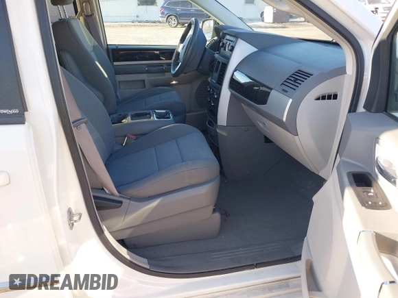 2010 Dodge Grand Caravan SXT with VIN 2D4RN5DX8AR239352, listed as a IAAI auction lot 41773487 with 86,084 mi miles and . Bid and sale history available at DreamBid. Image 5.
