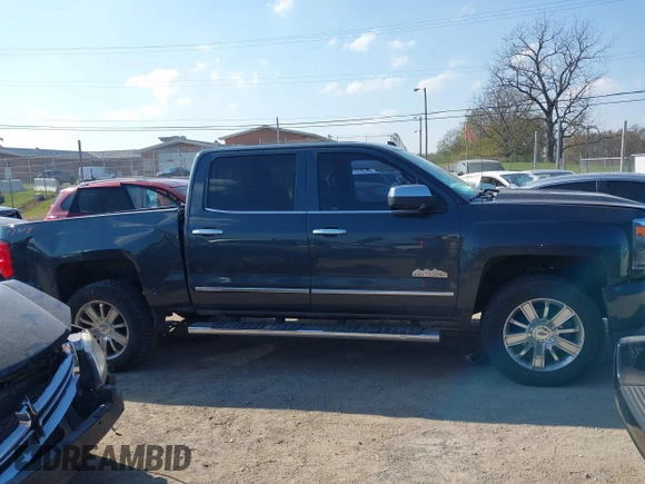 2018 Chevrolet Silverado 1500 High Country with VIN 3GCUKTEC8JG308353, listed as a IAAI auction lot 40714183 with 88,711 mi miles and . Bid and sale history available at DreamBid. Image 13.