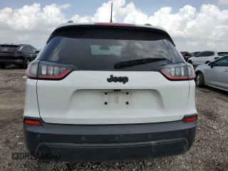 2020 Jeep Cherokee Latitude Plus with VIN 1C4PJLLBXLD561068, listed as a Copart auction lot 53815785 with 179,449 mi miles and Salvage title. Bid and sale history available at DreamBid. Image 6.