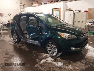 2014 Ford Escape Titanium with VIN 1FMCU9J93EUB95638, listed as a IAAI auction lot 41481089 with 182,258 mi miles. Bid and sale history available at carsss.com. Image 1.