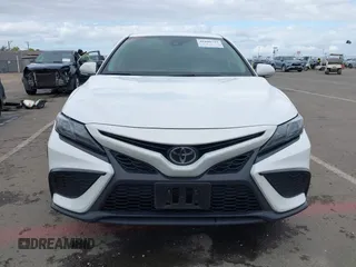 2023 Toyota Camry SE with VIN 4T1G11AK2PU822122, listed as a IAAI auction lot 41880757 with 56,106 mi miles and . Bid and sale history available at DreamBid. Image 12.
