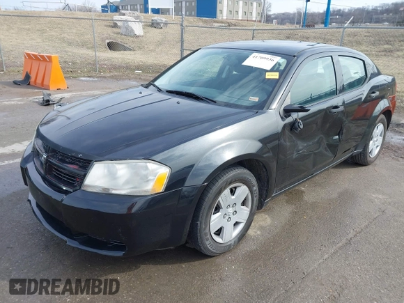 2010 Dodge Avenger SXT with VIN 1B3CC4FB3AN142126, listed as a IAAI auction lot 41709936 with 245,258 mi miles. Bid and sale history available at carsss.com. Image 2.